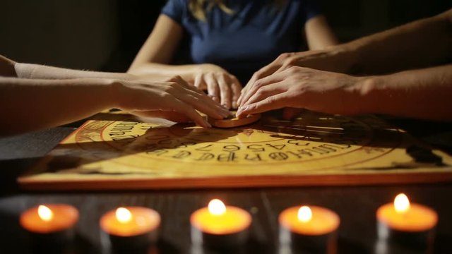 group of people at a spiritualistic. people call spirits