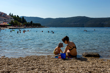 mother and son on the beach