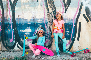 Colorful children with skateboards