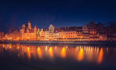 Fototapeta na wymiar Medieval waterfront reflecting in river, Gdansk, Poland