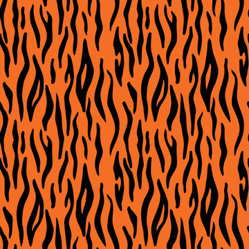Abstract animal print. Seamless vector pattern with tiger stripes. Textile repeating tiger fur background;