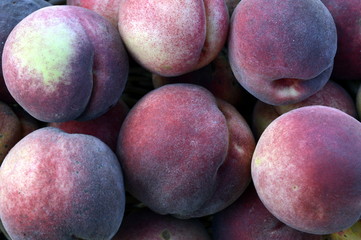 Large amount of peaches creates almost uniform background