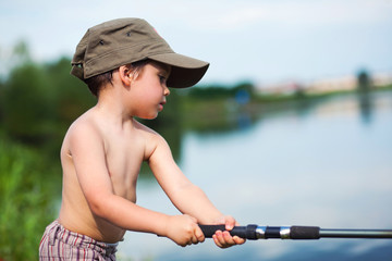 Obraz premium Child fishing