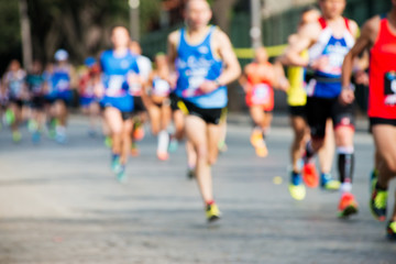Fototapeta premium runners in marathon abstract, blurry
