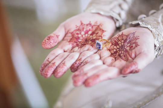Bride's Hand With Henna Tattoo And Jewellery, Wedding. 