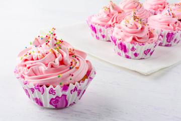 Pink birthday cupcakes close up