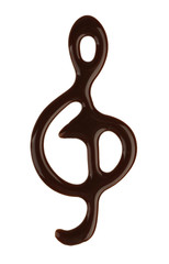 Drawn chocolate treble clef on white background