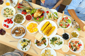 Friends eating on picnic