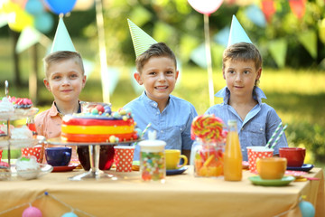 Children celebrating birthday in park © Africa Studio