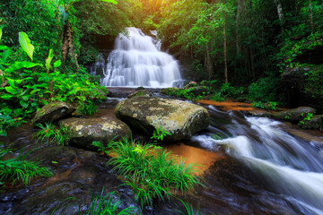 Mun Daeng Waterfall, the beautiful waterfall in deep forest during rainy season at Phu Hin Rong Kla National Park in Thailand