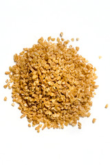 Bulgar wheat isolated on white