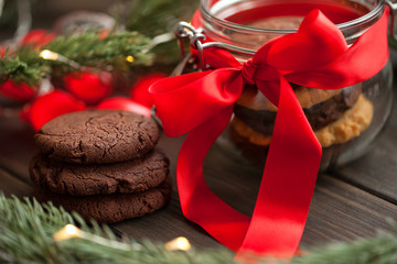 Christmas festive homemade decorated sweets on wooden background