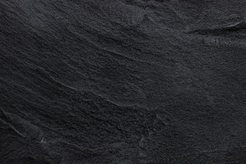 Naklejka premium Dark grey black slate background or texture.