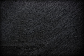 Dark grey black slate background or texture. © peekeedee