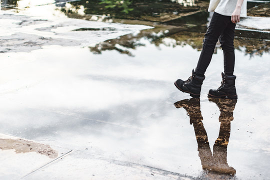 Girl Wearing Jeans And Black Combat Boots