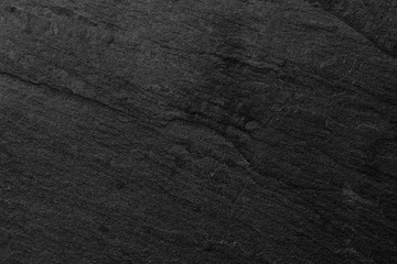 Dark grey black slate background or texture.