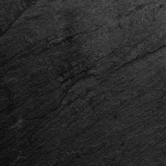 Dark grey black slate background or texture.