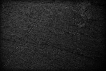 Dark grey black slate background or texture.