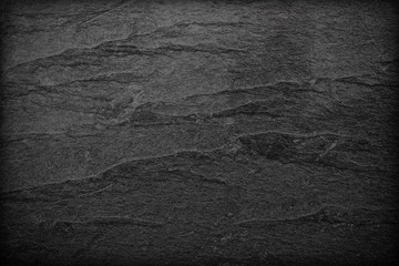 Dark grey black slate background or texture.