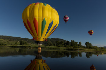 Hot-Air Balloon reflecting in Lake 