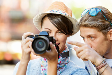 Smiling couple with the camera