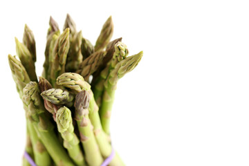 Fresh green asparagus isolated on a white