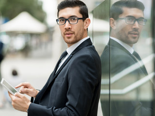 Portrait of handsome businessman outdoor