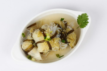 Streamed lettuce wrap minced pork by shallot in bone soup. Top view