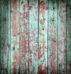 Aged green wooden background.