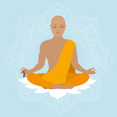 Tibetan monk in an orange robe.