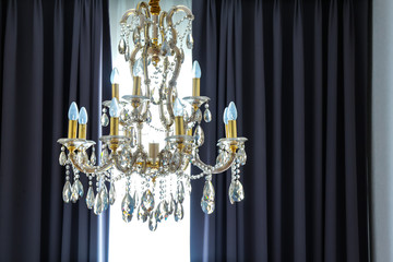 shining chandelier and curtain
