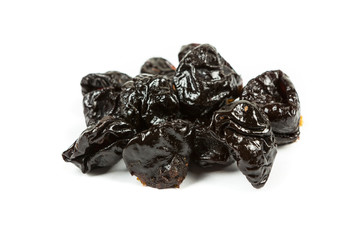 Dried plums / prunes isolated on white background