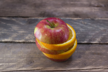 Fresh ripe fruits on a wooden table .