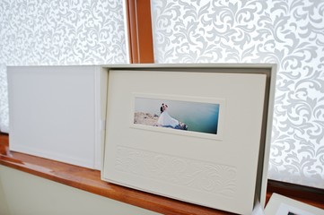 White luxury leather wedding book and album with flash or cd box