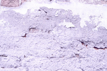 Wall fragment with scratches and cracks