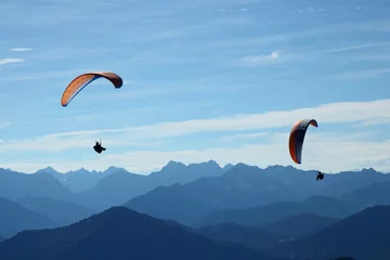 Photo sur Plexiglas Sports aériens Parapentes dans le ciel