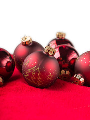 Christmas shiny balls on red background