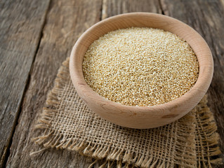 organic quinoa on old background