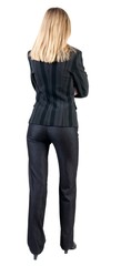back view of standing beautiful blonde  business woman. Young girl in suit. Rear view people collection. backside view of person. Isolated over white background.