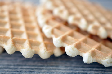 The sweet crackling cookies on a wooden gray table