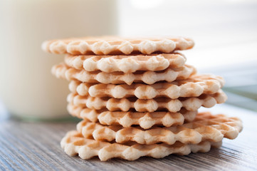 Sweet biscuits and a bottle of milk