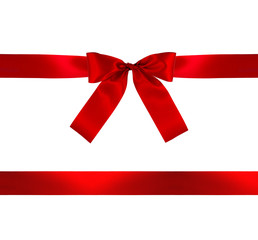 Red gift bow and ribbon on white background with clipping path.