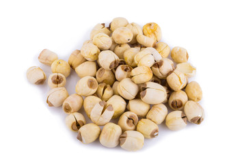 Dried lotus seeds on white background