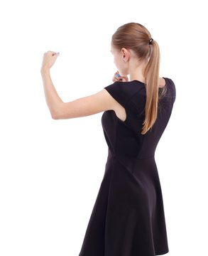 skinny woman funny fights waving his arms and legs. Blonde in a short black dress ready to fight.
