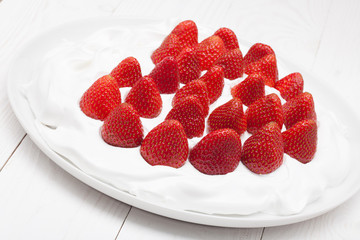 strawberry whipped cream on a plate