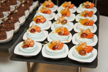  merangue topped with mixed fruit