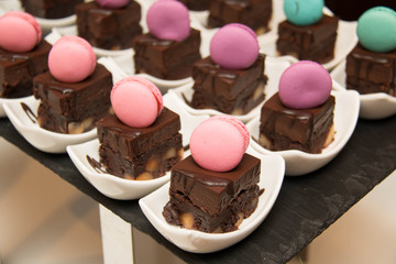  mini chocolate cakes on a plate