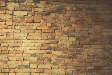 Old brick wall with sun shade vintage for background.