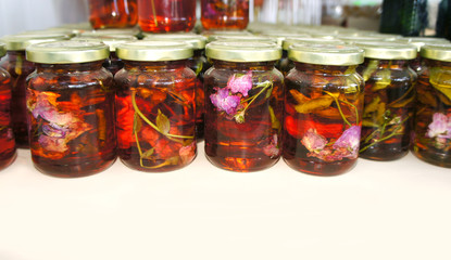 Fototapeta na wymiar Jam made of herbs and flowers in jars