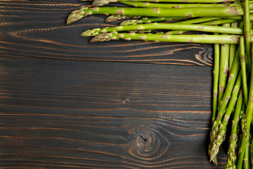 harvested asparagus on wooden
